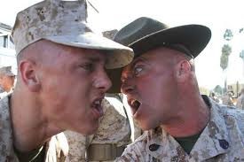 A Marine recruit receiving individual attention from a Drill Instructor. (Photo Courtesy of www.marinecorpstimes.com)