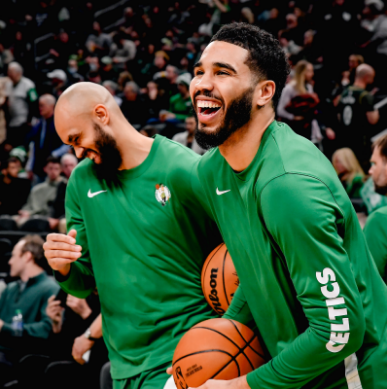 Star Jayson Tatum and teammate Derrick White laughing. Image via Boston Celtics Twitter.