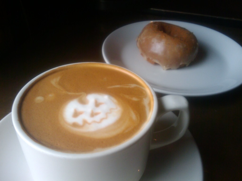 "Pumpkin latte art" by Jack Hebert is licensed under CC BY 2.0.